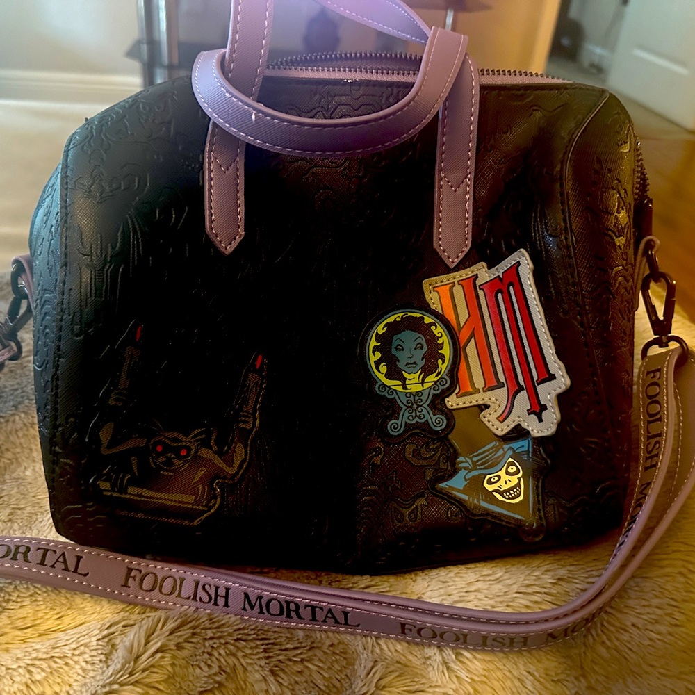 Loungefly Haunted Mansion satchel bag.